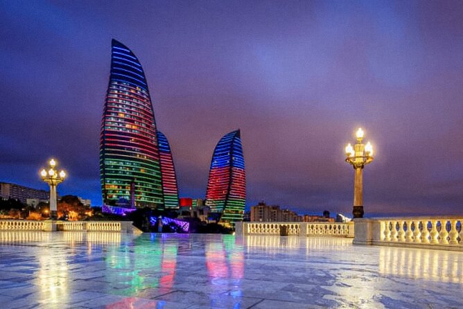Baku Night City Tour Discover the Magic of Illuminated Landmarks - The Heydar Aliyev Center under lights