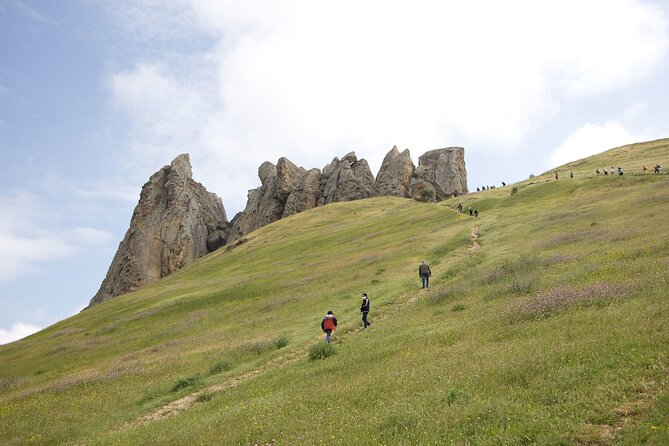 Beshbarmag mountain with sea view and Candy Mountains <em> Day Tour – Key points to know before booking’ /></p>
<ul>
<li><strong>Beshbarmag is the main natural highlight:</strong> See the Five Fingers rock formation near the Caspian Sea and hear why locals still visit it for prayer.</li>
<li><strong>Masazir looks best in morning light:</strong> The lake can show pink tones, with reddish sand along parts of the shore.</li>
<li><strong>Candy Cane Mountain needs sunshine:</strong> Beige, pink, and white bands are easiest to see on a bright day.</li>
<li><strong>The group stays small:</strong> The tour accepts no more than 12 people, a useful size for a full-day outing.</li>
<li><strong>The price covers more than the countryside:</strong> At $60, you also visit Heydar Mosque and the Heydar Aliyev Centre.</li>
<li><strong>Guides can shape the day:</strong> Samir, Sabina, and Riyadh have been singled out for clear explanations, good humor, and attentive service.</li>
</ul>
<h2>Why this $60 day trip works well from Baku</h2>
<p><img width="669" height="446" decoding="async" src=