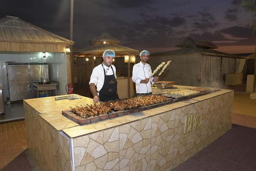 Dubai: Desert Safari, Camel Ride, Quad Bike & BBQ Dinner - What the $28 price really covers