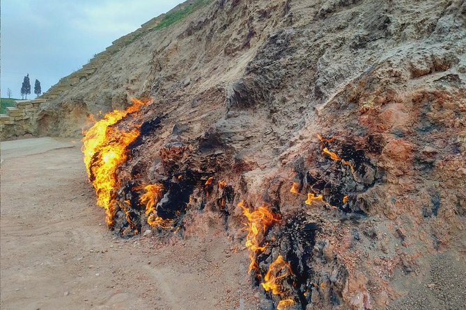Gobustan, Mud Volcano, Burning Mountain and Fire Temple Tour - Yanar Dag: a flame on the Absheron Peninsula