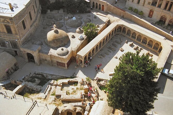 Group Walking Tour in Baku Old City - Bukhara Caravanserai and trade routes